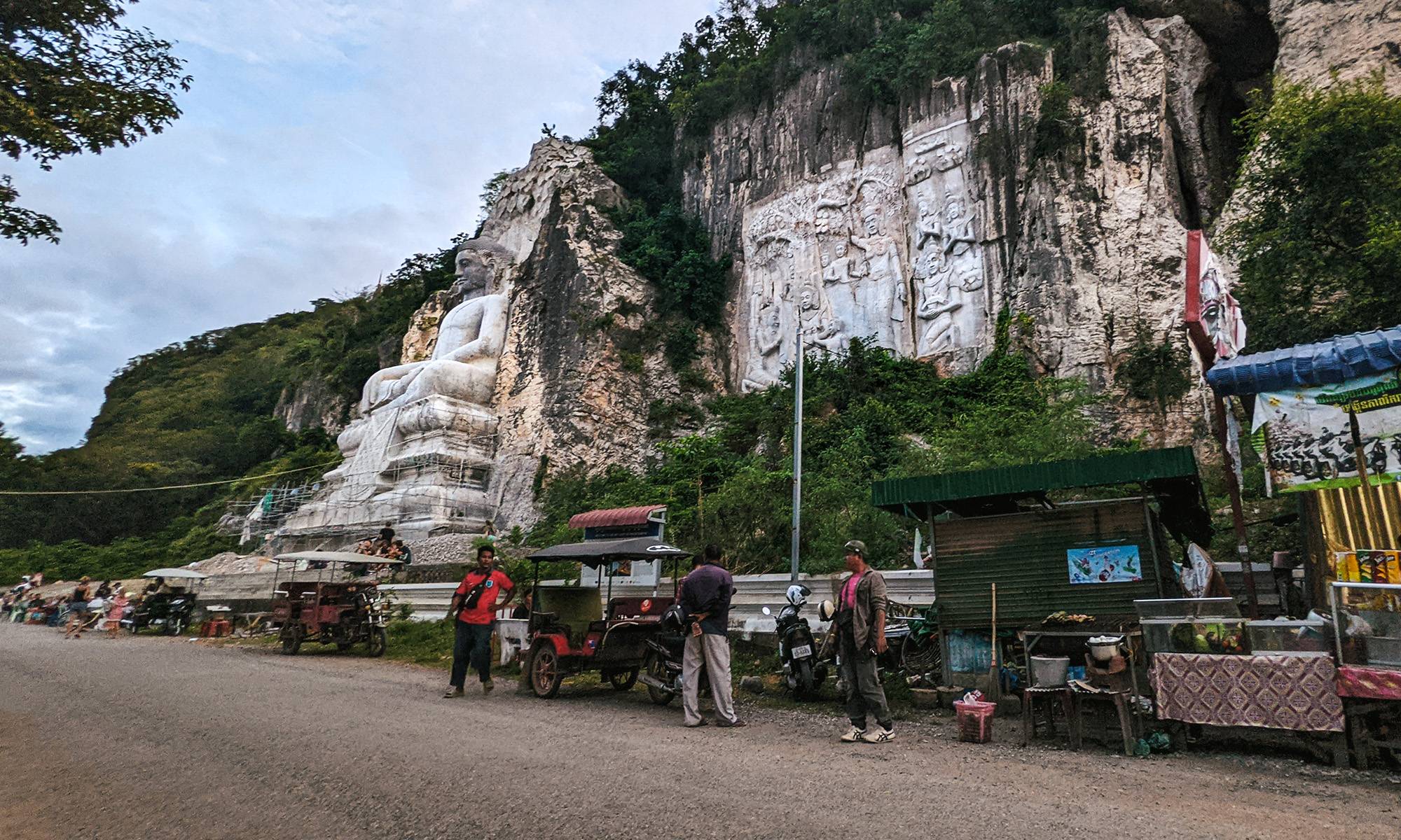 Locals standing outside the Battambang bat caves